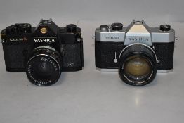 Two Yashica cameras. A Yashica TL- Electro with Yashicon 1:1,2 f-=55mm lens and a Yashica TL Electro
