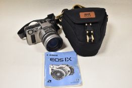A Canon EOS IX camera with Canon EF 24-85mm 1:3,5-4,5 lens