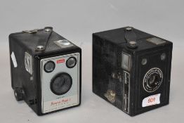 Two box cameras. A Kodak Brownie Model 1 amnd a Kodak six-20 Popular brownie