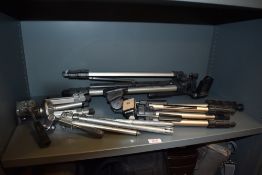 Four various tripods