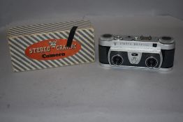 A Wray Stereo Graphic camera