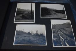 Photograph Album. Devoted entirely to the construction, completed property, and environs of a