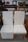 An early 20th century utility chair having rush seat and Oak frame.