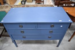A painted bedroom chest of two over three drawers on square tapered legs