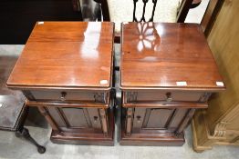A pair of modern stained mahogany bedside cabinets, of 19th century design 66cm