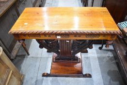 A reproduction mahogany pedestal side table, having gadrooned edge detail and hatched panels over