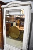 A shabby chic style mirror door wardobe/armoire