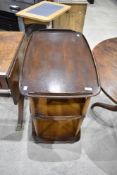 A dark stained Ercol tea trolley