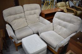 A modern elm framed two-piece lounge suite, comprising two seater settee and chair and sold together