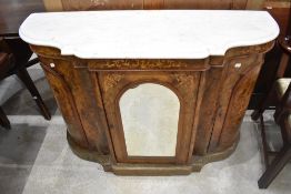 A Victorian marble topped and inlaid walnut credenza, of shaped breakfront form with central
