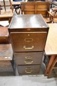 A 20th century filing cabinet having Oak case and brass handles. 42cm W x 106cm H