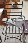 A wrought iron garden chair