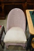 A Lloyd Loom nursing chair