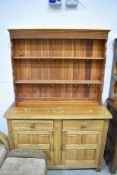 A traditional pine kitchen dresser in the Old Charm style