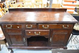 A Victorian mahogany sideboard, width approx. 153cm