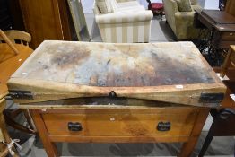 A traditional butchers block , set on drawer base
