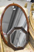 A 1920's type oval mahogany mirror, sold together with a bead moulded and bevelled octagonal oak