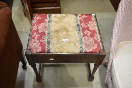 A Stained frame piano stool having turned legs
