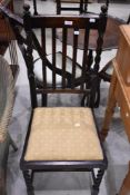 A 1940's oak barley twist dining chair, with upholstered drop-in seat