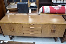 A mid century Europa Furniture Long John style sideboard