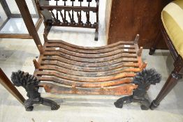 A traditional cast iron dog grate