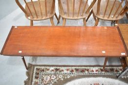 A mid century Teak coffee table on Dansette legs 120cm Long