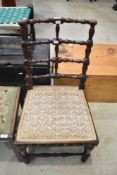 An interesting 19th Century salon or dining chair having turned mahogany frame