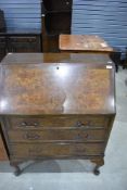 A mid 20th Century walnut bureau