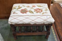 A Victorian spindle frame footstool