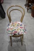 A traditional stripped bentwood chair