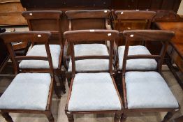 A set of six early Victorian dining chairs, comprising carver and five singles, each having