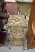 A Victorian style cast brass three tier plant stand