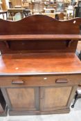 A 20th century figured mahogany chiffonier, of plain but traditional design 143cm x 97cm
