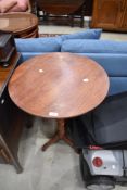 A 19th Century and later pedestal occasional table having circular snap top, diameter approx 53cm,