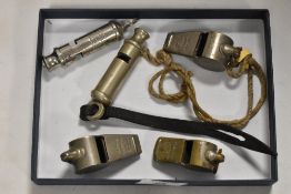 A selection of early 20th century whistles including three Acme Thunderer, a Hudson ARP and a Hudson