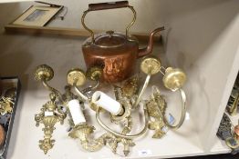 A selection of vintage wall mounted double branch lights in brass.