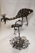 Three modern metal bird sculptures possibly for the garden.