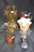 A selection of glass vases and a water jug with hand painted flower design.