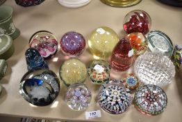 Fourteen paper weights including three Caithness, two by Wedgwood, Lamp work designs and a fine
