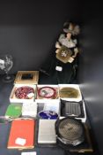 A selection of ladies make up compacts including Stratton, also a cigarette case and model doll.