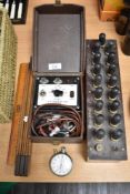An A.M Lock and Co volt meter with a similar Gambrell electricity meter, two rulers and a working