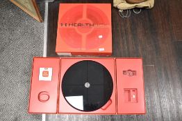A modern HTC Health box fitness system, scale only.