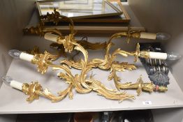 Three fine wall mounted three branch lights, being well cast in brass with gilt finish in floral