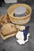 A 20th century Gents Woodrow grey top hat approx 60cm size in case with two ladies fur hats.