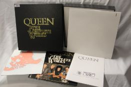 A copy of Queen 'The Complete Works' NM/NM with all the relevant inners and 14 albums