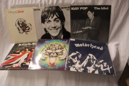 A lot of six heavy rock albums including Whitesnake, Motorhead and Iggy Pop Play loud and please