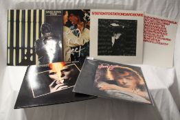 A lot of four Bowie albums and also 12' single