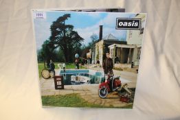 Oasis- Be Here Now- deluxe compact disc boxed set in all around excellent condition, comes with