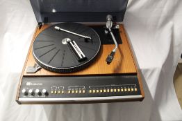 An ADC Accutrack 4000 turntable, a cool retro looking bit of kit and sounds decent to, automatic
