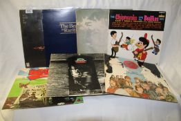 A lot of seven Beatles compilations including the rarely seen 'Live in Italy'